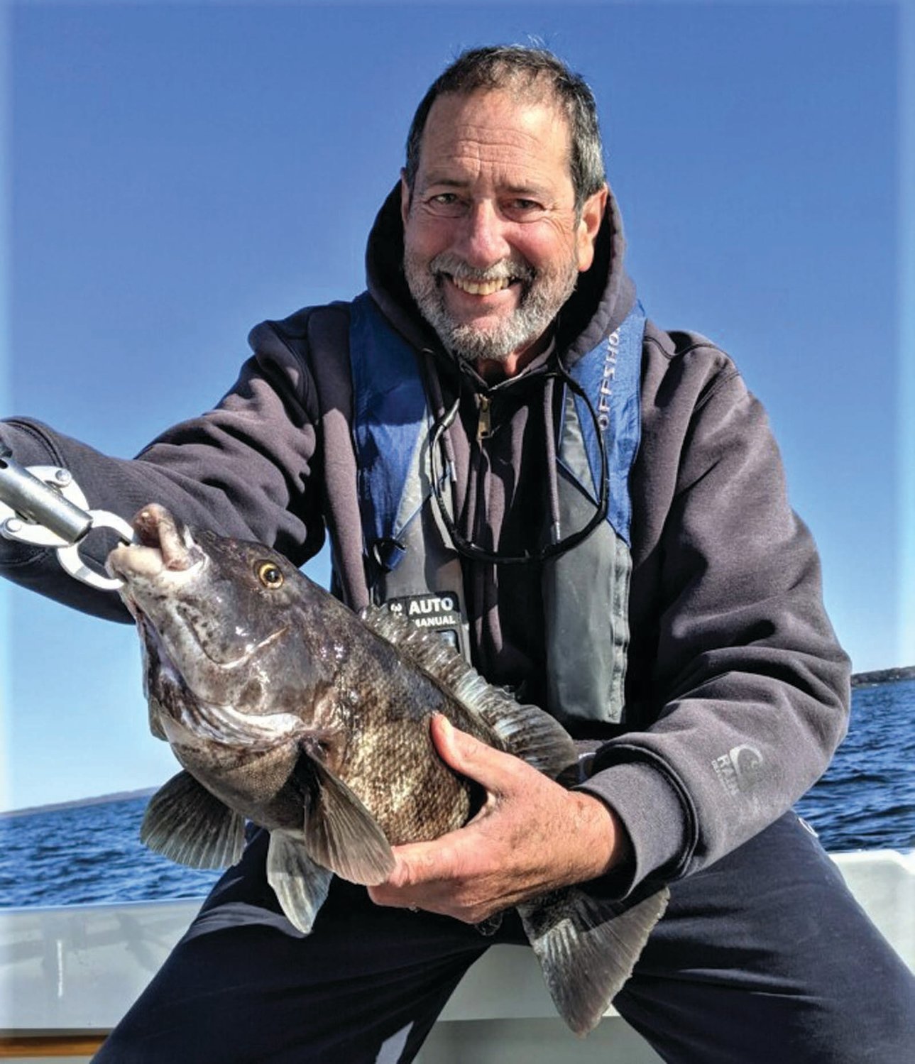 TAUTOG BITE STRONG: Capt. Dave Monti of Warwick with a healthy 5-pound tautog caught Monday at General Rock, North Kingstown.